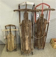 THREE WOODEN SLEDS