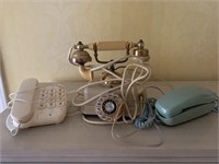 3 old telephones