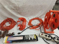 Extension cord lot, 3 orange cords,  power strip,