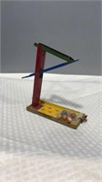 Vintage tin marble game with marbles.