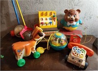 Mid century Fisher Price pull and push toys