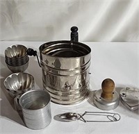 Sifter, molds, cup, cutters and spoon