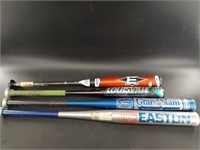 Collection of baseball and softball bats
