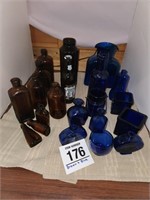 Assorted brown & blue glass