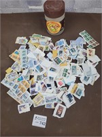 Stamp collection with vintage container