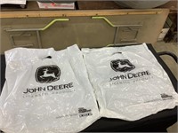 2 John Deere  plastic bags