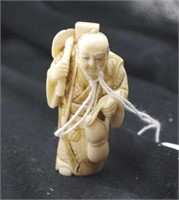 Japanese carved ivory market seller okimono