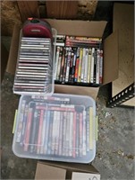 DVD's and CD's. 7 boxes altogether. 1 box of VHS