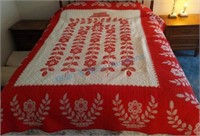 Red cross-stitch quilt