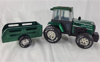 Ny-Lint toy tractor with trailer