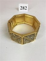 GOLD TONE YVES ST LAURENT RHINESTONE BRACELET