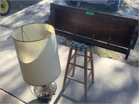 Lamp, stool, wood shelf