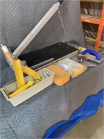 Tile cutter and miscellaneous tile cutting tools.