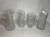 4 Crystal pitchers