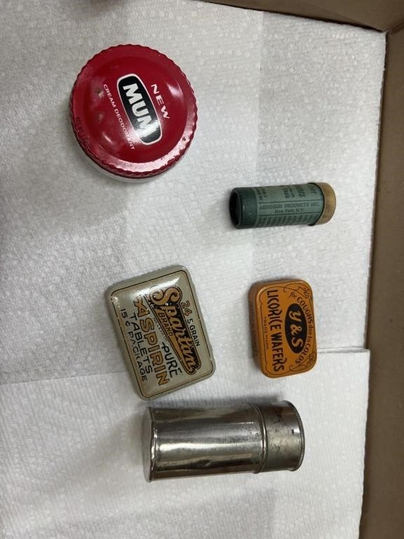 Antique medicine advertising cans