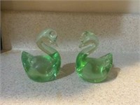 2 small green glass birds