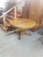 54' Round Oak Claw foot Table 4 1/2 leaves