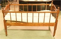 Lot #284 - Antique Walnut folding crib with