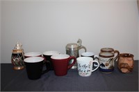 Assortment of coffee mugs and 2 beer steins