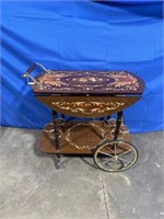 Vintage tea cart with floral pattern