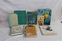 Assortment of books, Seashells, Caribbean