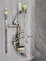 Fred Bear Pursuit bow with arrows.  Look at the