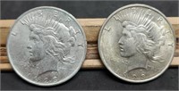 (2) 1923 AU Peace Silver Dollars