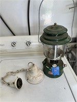 Coleman lantern and antique light fixture