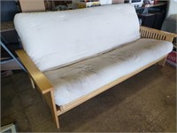 Wood framed futon/ cushion needs cleaned