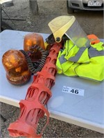 High vis vests, bunding amber rotating lights.