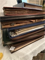 Large collection of scrapbooks and old photos.