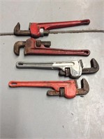 lot of heavy duty pipe wrenches various sizes