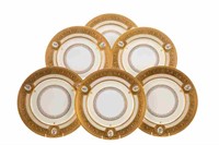 SET OF GILDED PORCELAIN DINNER PLATES