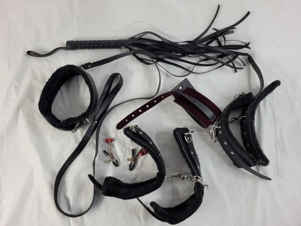 Various bondage items including dog collar