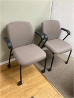 2 arm chairs on castors
