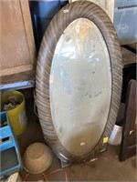 Antique oval mirror in frame just needs a little