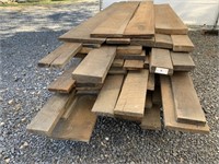 Lumber Pile: Mostly red oak, 1"-2" thick.