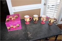 4 Pedestal mugs- Dressed up