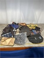 Large assortment of purses and bags