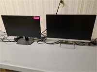 2 Computer Monitors on Table in Server Room