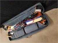 Tote with a lot of archery equipment looks like