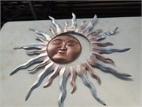 Metal sun & moon wall art