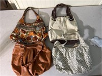 4 used purses,