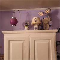 Top shelf cabinet - stuffed animal, candle , more