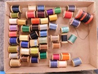 49 wooden spools of thread