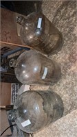 3 large glass jugs appropriate 28” tall.  Local