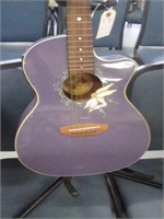 Luna purple guitar on stand
