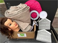 Box with duvet cover & pillowcases mannequin head.