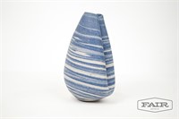 Swirled Pottery Vase with Blue Background