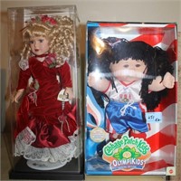 2 DOLLS - NEW IN BOX BRASS KEY PORCELAIN DOLL AND